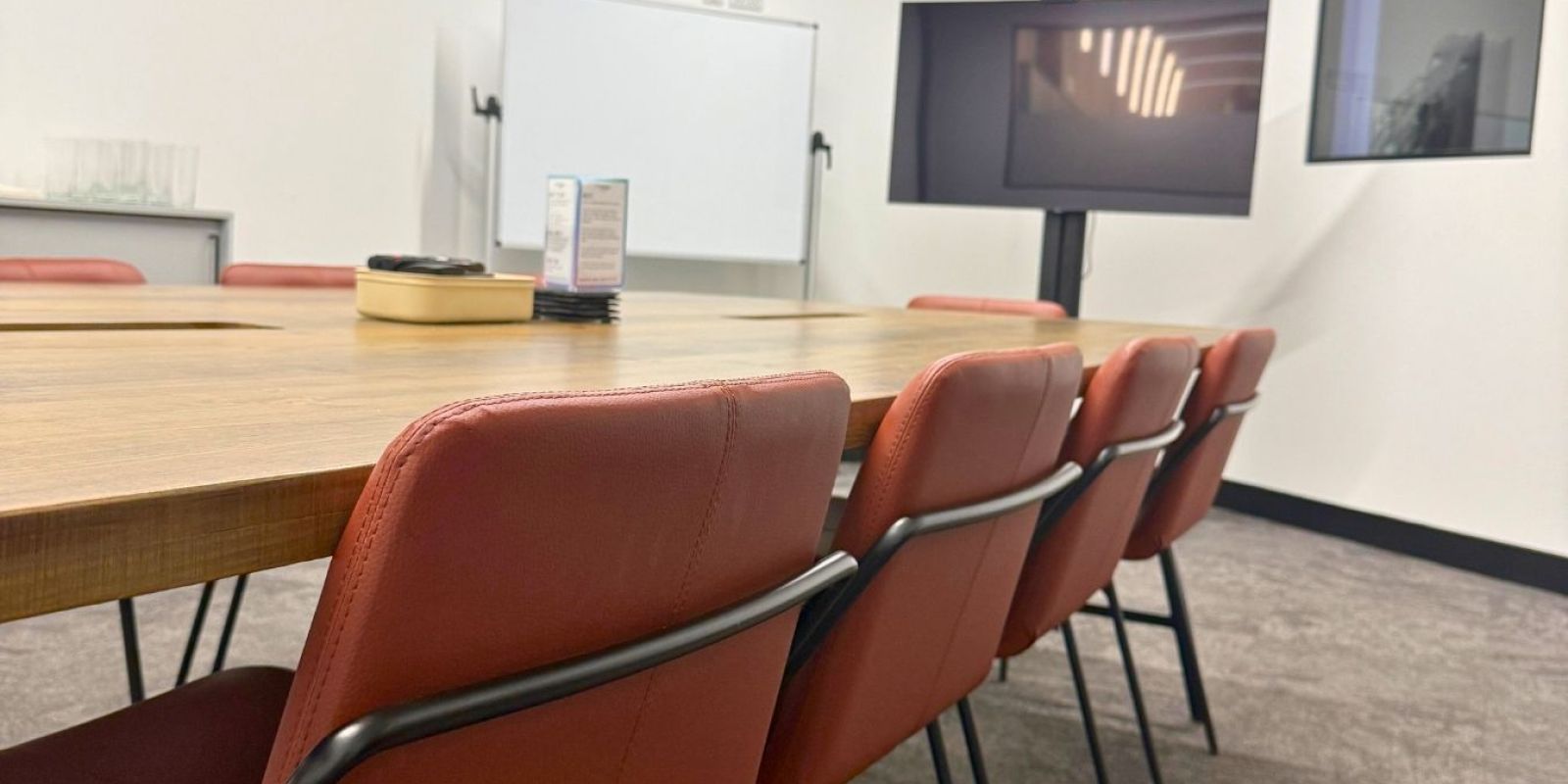 Meeting room at Mosaic set up for collaborative work and business meetings