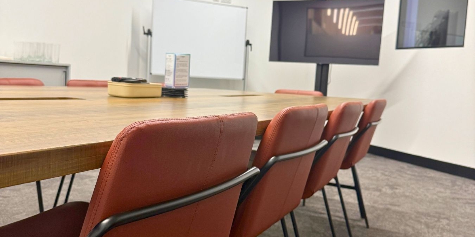 Meeting room at Mosaic set up for collaborative work and business meetings